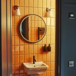 Open door into a brightly lit bathroom with orange tiles.